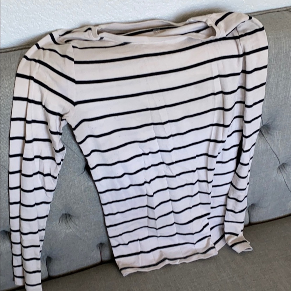 Gently used thin black and white stripped shirt.